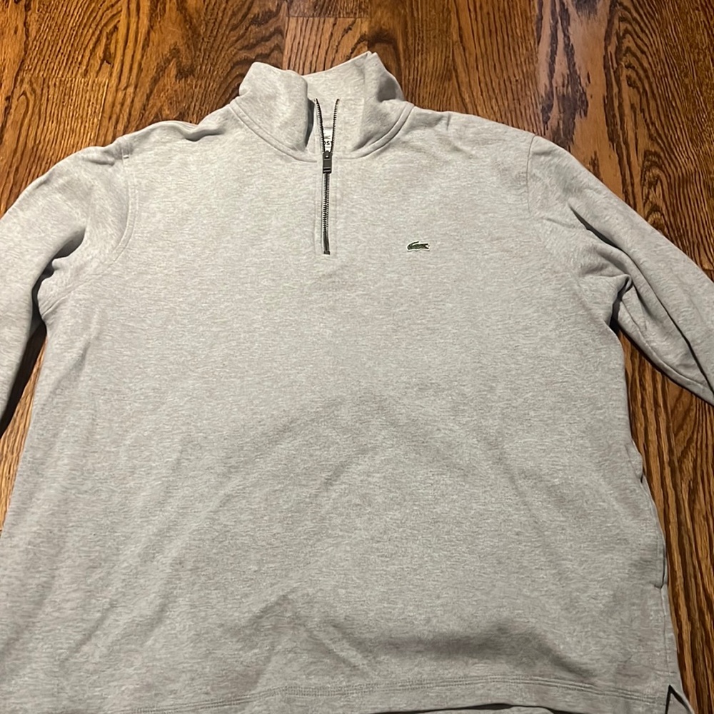 Gently worn size 8 Lacoste quarter zip pullover